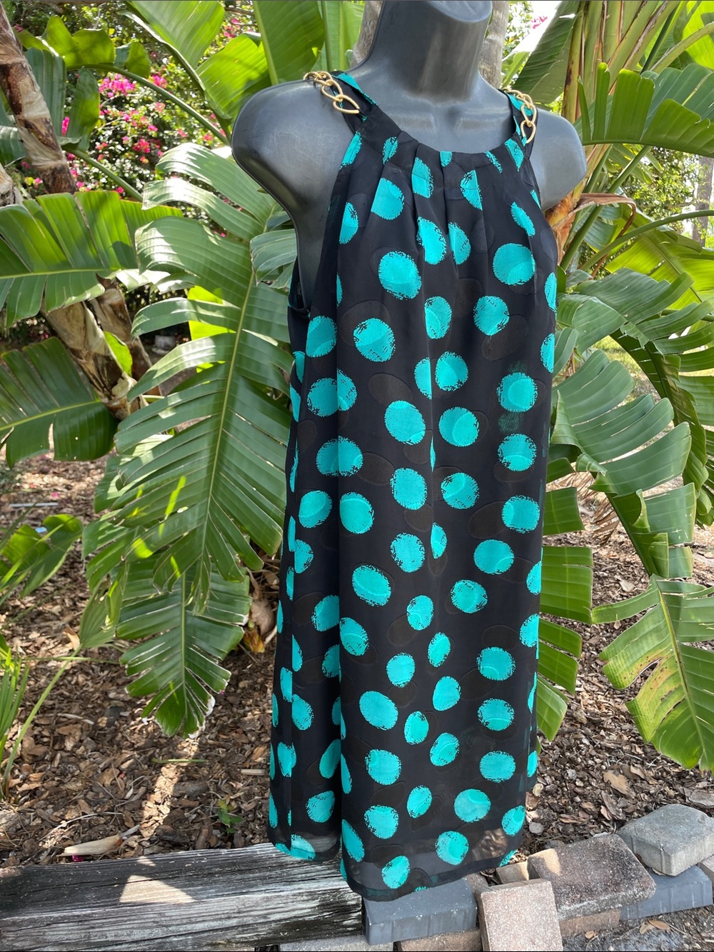 Jade chain neck, polkadot sheath dress
